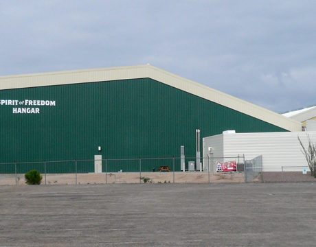 Custom Hangar Museum with Asymmetrical Design