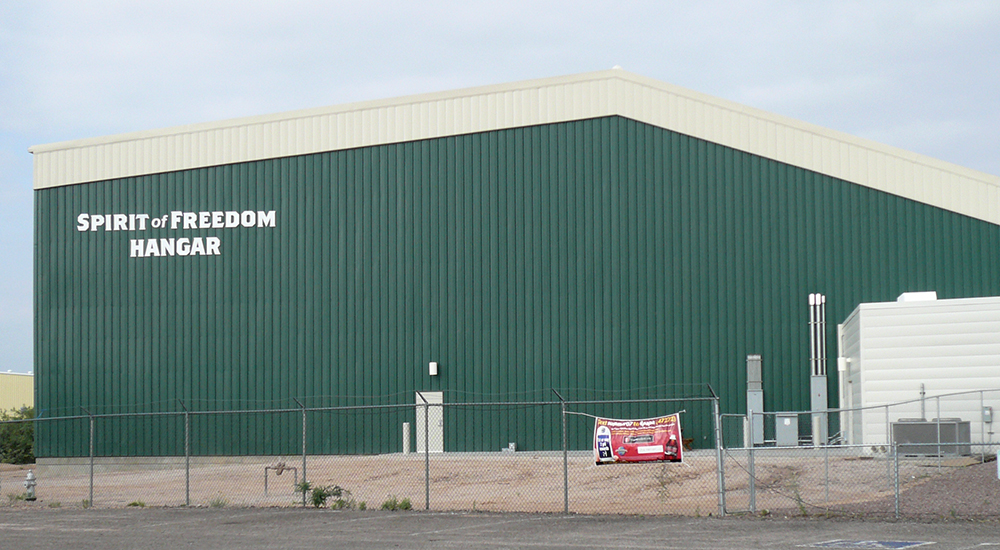 Custom Hangar Museum with Asymmetrical Design