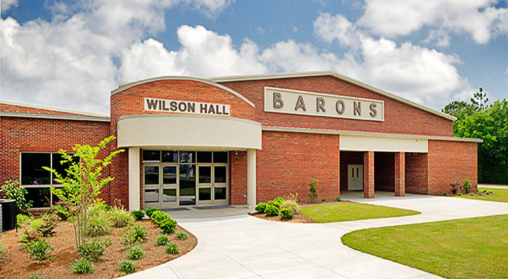 High School Sports Building with Curtain Wall